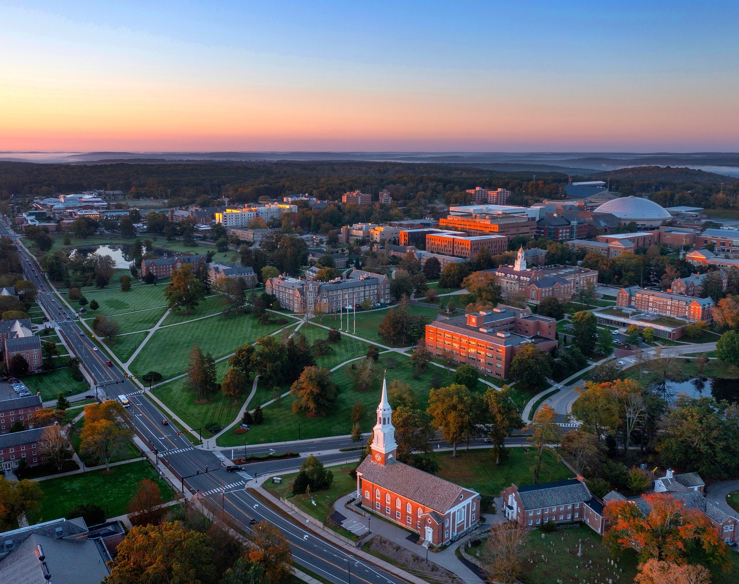 Arial view of UConn campus in 2020s (summer) looking south showing junction of Storrs Road and North Eagleville Drive and part of the campus from this vantage point